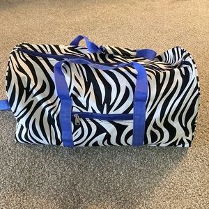 Zebra stripe and purple weekender bag